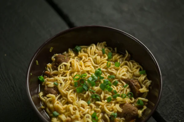 Asian quick noodles on wood background photo — Stock Photo, Image