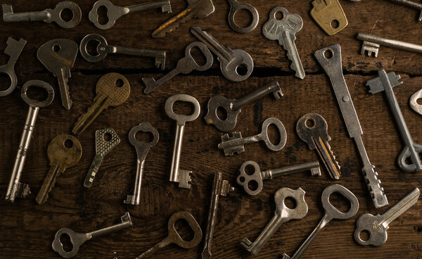 Set of keys on wood background