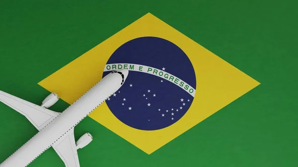 Top Down View of a Plane in the Corner on Top of the Country Flag of Brazil