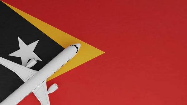 Top Down View of a Plane in the Corner on Top of the Country Flag of East Timor