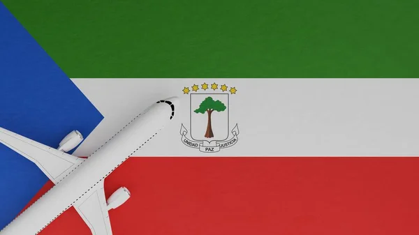 Top Down View of a Plane in the Corner on Top of the Country Flag of Equatorial Guinea