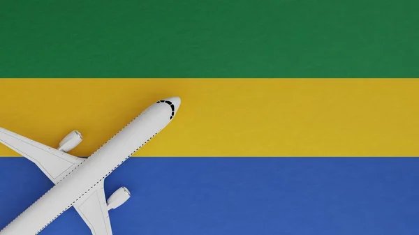 Top Down View of a Plane in the Corner on Top of the Country Flag of Gabon