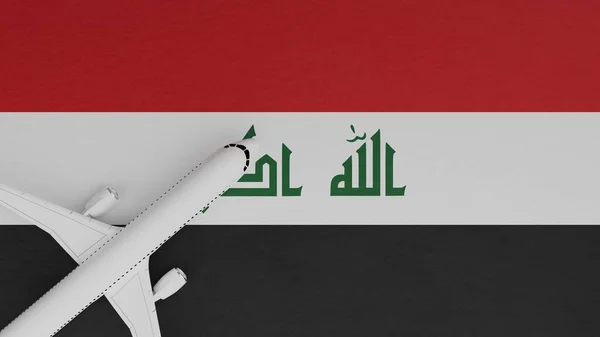 Top Down View of a Plane in the Corner on Top of the Country Flag of Iraq