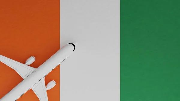 Top Down View of a Plane in the Corner on Top of the Country Flag of Ivory Coast