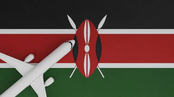 Top Down View of a Plane in the Corner on Top of the Country Flag of Kenya