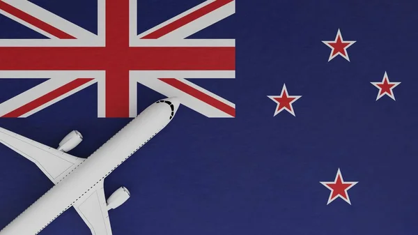 Top Down View of a Plane in the Corner on Top of the Country Flag of New Zealand
