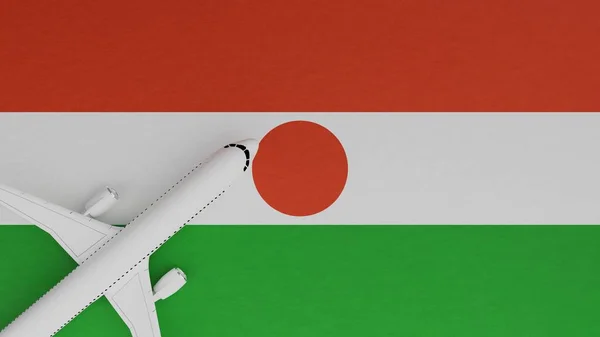 Top Down View of a Plane in the Corner on Top of the Country Flag of Niger