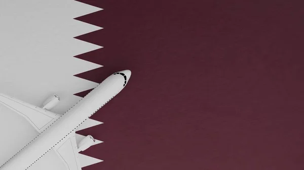 Top Down View of a Plane in the Corner on Top of the Country Flag of Qatar