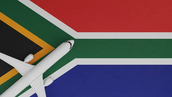 Top Down View of a Plane in the Corner on Top of the Country Flag of South Africa