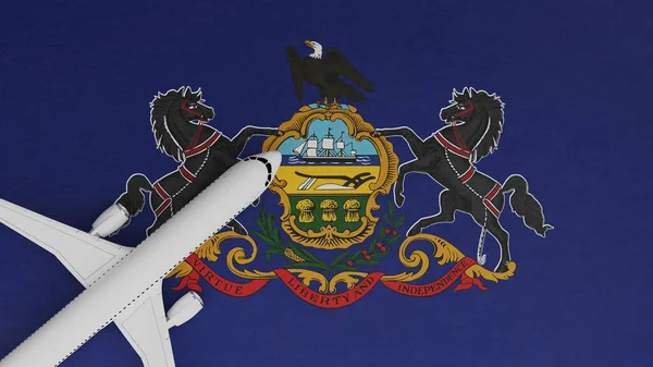 Top Down View of a Plane in the Corner on Top of the US State Flag of Pennsylvania