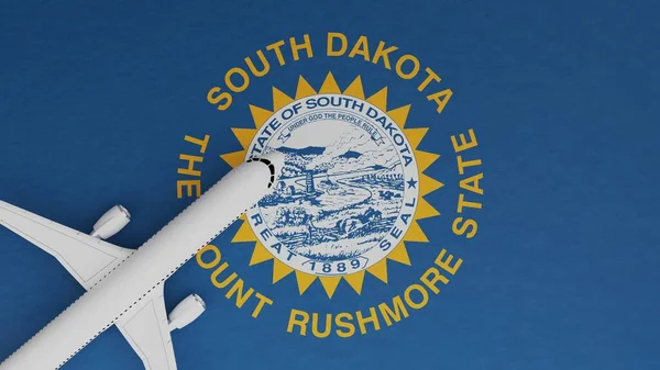 Top Down View of a Plane in the Corner on Top of the US State Flag of South Dakota