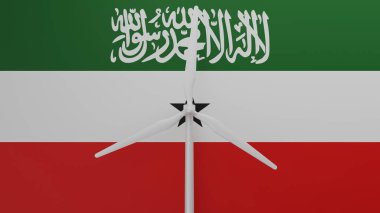 Merkezde, Somaliland bayrağının arka planına sahip büyük bir rüzgar türbini.
