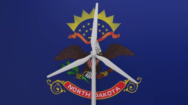 Merkezde, Kuzey Dakota ABD bayrağının arka planına sahip büyük bir rüzgar türbini var.