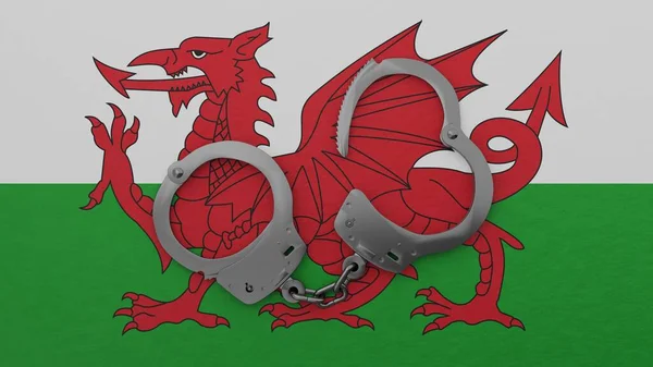 Half Opened Steel Handcuff Center Top Flag Wales Stock Picture