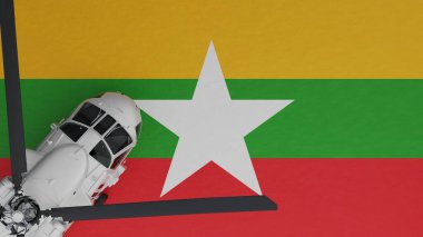 Sol alt köşedeki Beyaz Helikopter 'in yukarıdan görünüşü ve Burma Ulusal Bayrağının tepesi (Myanmar)