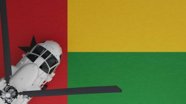 Sol alt köşede ve Gine-Bissau Ulusal Bayrağı 'nın tepesinde bir Beyaz Helikopter' in yukarıdan görünüşü