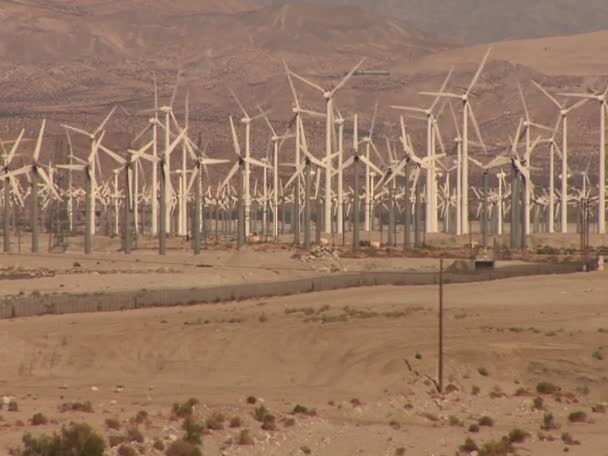 Windmills rotate in a breeze — Stock Video