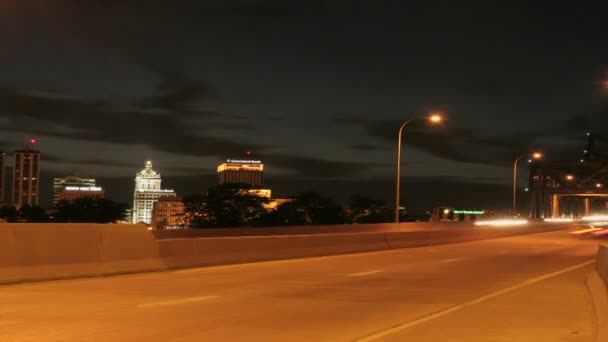 Traffic passes along a city freeway — Stock Video