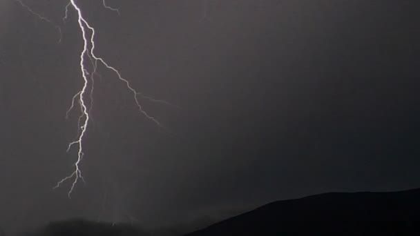 Lightning flashes under storm clouds — Stock Video