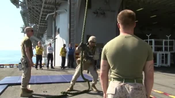 Sailors aboard an aircraft carrier — Stock Video