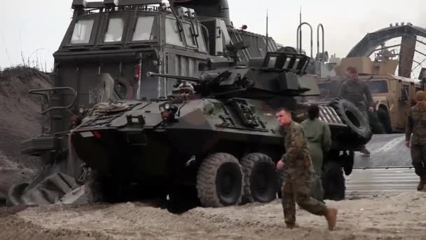 Amphibious assault vehicles for a beach landing — Stock Video