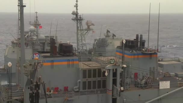 Navy ships travel alongside — Stock Video