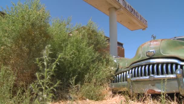 Usted car at an abandoned trading post — Stock Video