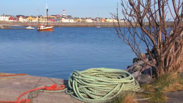 Fishing village with lighthouse — Stock Video