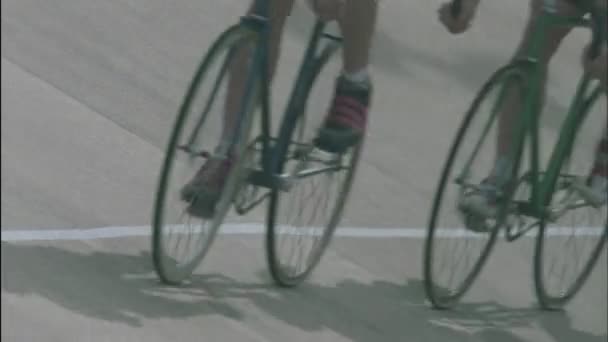 Bicyclists racing on a circuit track — Stock Video