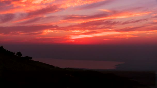 死海の背後に夕日 — ストック動画