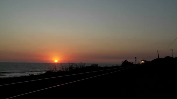 Train passing by a California beach — Stock Video