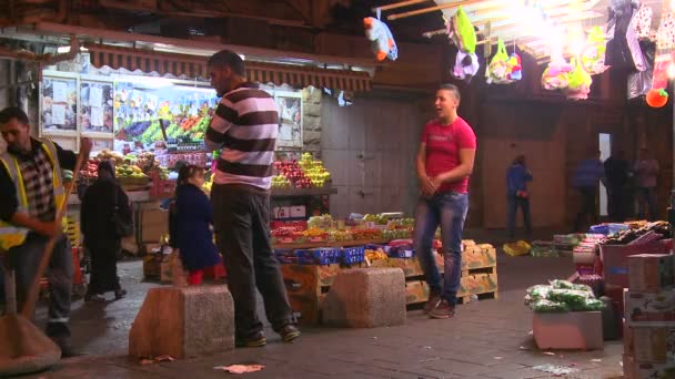 Vendors at market stalls — Stock Video