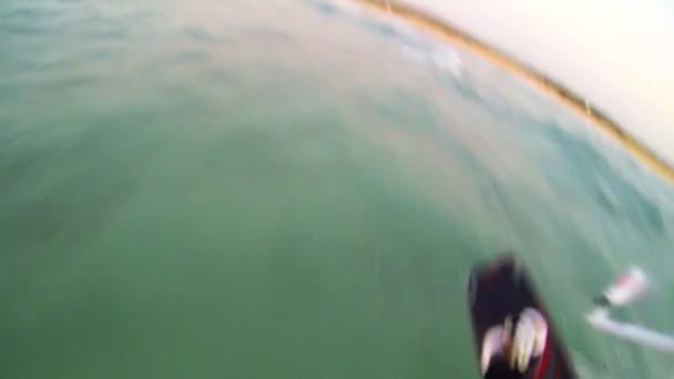 Windsurfer moving across waves — Stock Video