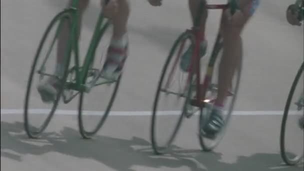 Bicyclists racing on a circuit track — Stock Video