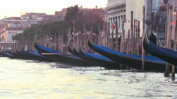 Gondolas bob in the waves — Stock Video