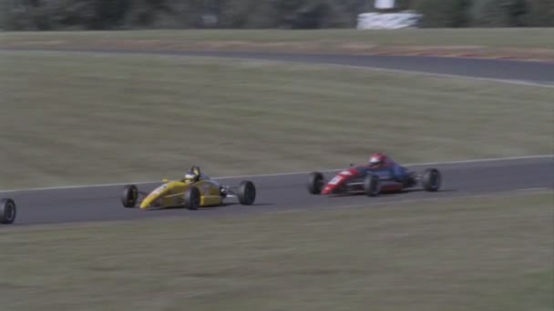 Race cars take a sharp turn — Stock Video