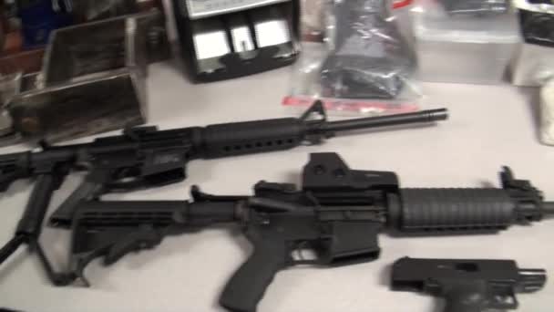 Weapons and drugs are seized by the DEA — Stock Video