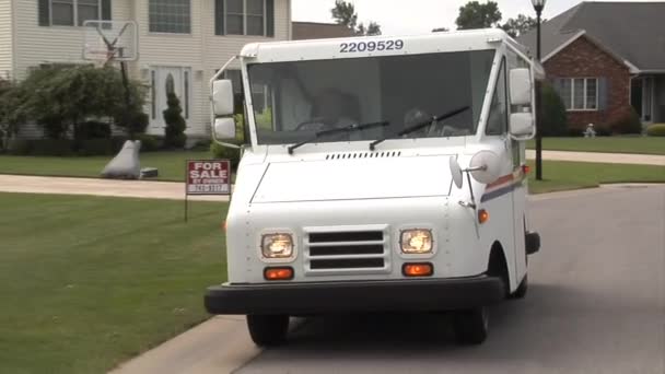 U.S. Postal vehicles deliver mail — Stock Video