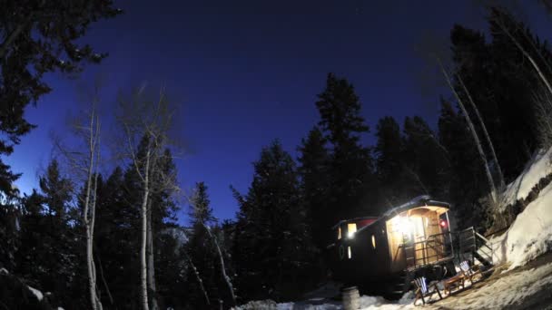 Night sky above a train caboose — Stock Video