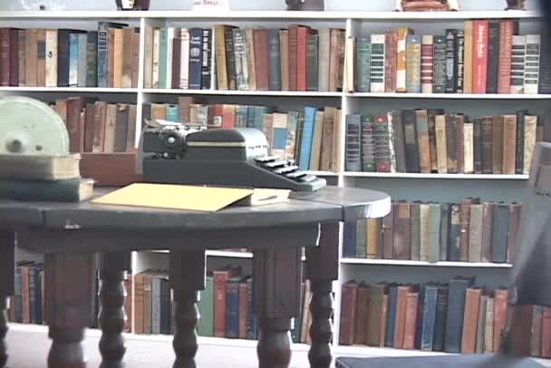 Typewriter sits on a table — Stock Video