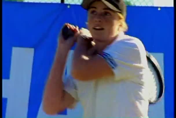 Tennis player hitting ball — Stock Video