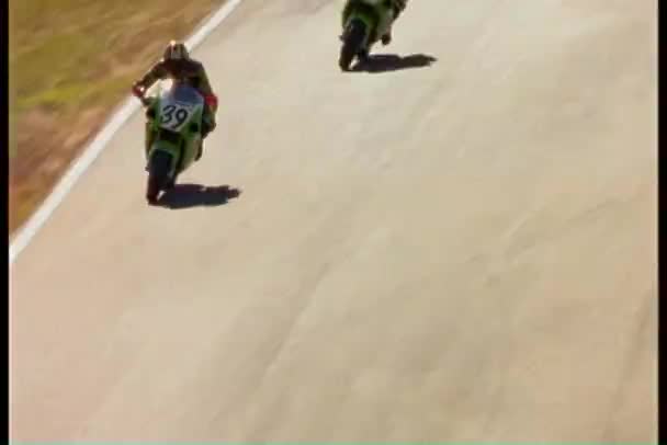 Motorcycle riders into a sharp — Stock Video