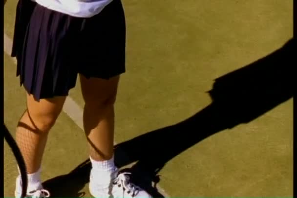 Tennis player hitting ball — Stock Video