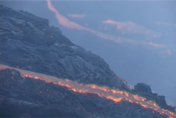 Lava flow down the side of a volcano — Stock Video