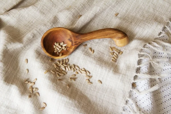 Wooden spoon hand on the table.