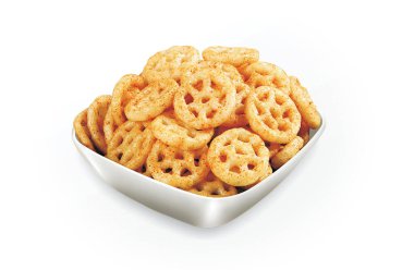 Çıtır çıtır ve çıtır tuzlu buğday tekeri, Wheelos, frrymus, Frymus, Fried and Spicy abur cubur, Hint Kese Paketleme Sokak Yemeği, seçici odak -