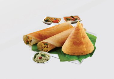 Güney Hindistan Masala Dhosa ya da dosa sambhar, hindistan cevizi turşusu, kırmızı turşu ve yeşil turşu ile servis edilir.