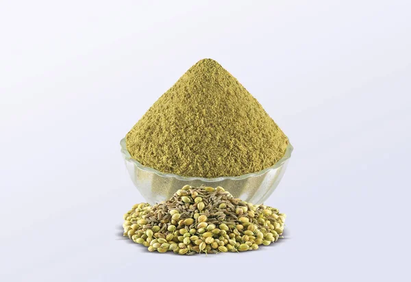 Coriander Powder (Dhaniya Powder) in a glass bowl with Coriander Seeds, Indian spices - Image.