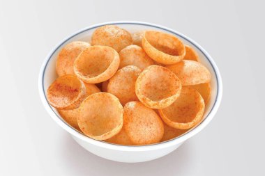 Crispy and crunchy Salty wheat cup or Katori, vatka, moon chips, vatki, fryums, snack food clipart