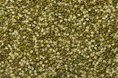 Split Mung Bean Lentils Also Know as Mungbean, Green Moong Bean, Mung Gram, Vigna Radiata, Green Gram, Golden Gram Legumes, Moong Bean, Moong Dal, Green Bean or Mung Daal. clipart